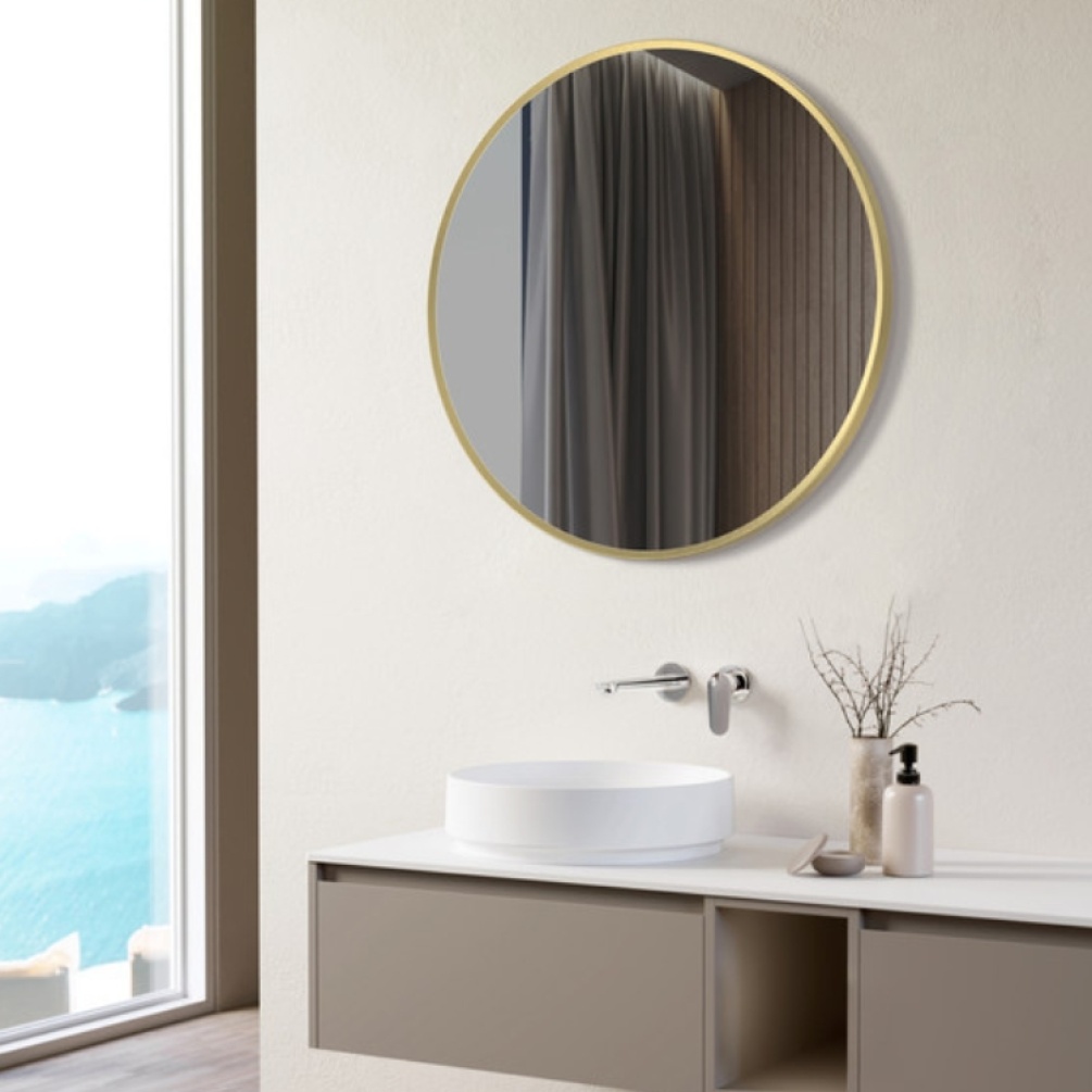 Product Lifestyle image of the Apex Brushed Brass 600mm Round Mirror